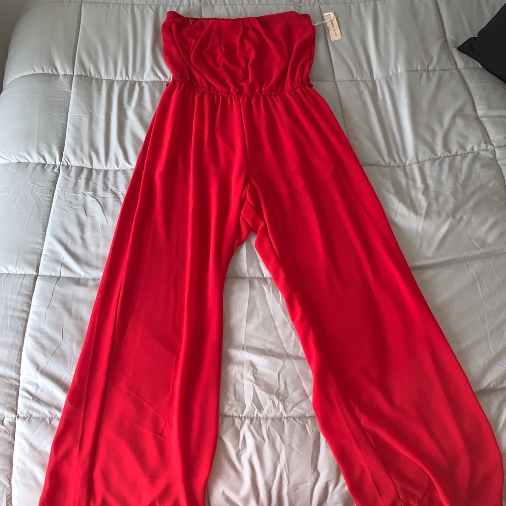Jumpsuits never worn has tags on it !!!